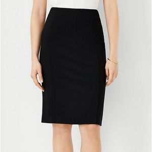 Issac Hazan Black Pencil skirt, size 10, back button/zip closure, back slit